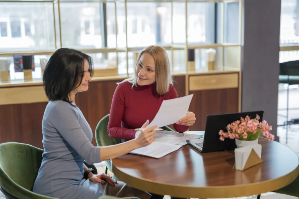 employee discussing about tipped minimum wage after planning work hours with Time Tracking Tool