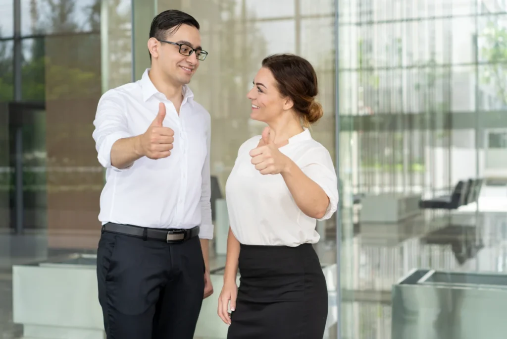 employees giving thumbs up about Employee Time Tracking Software