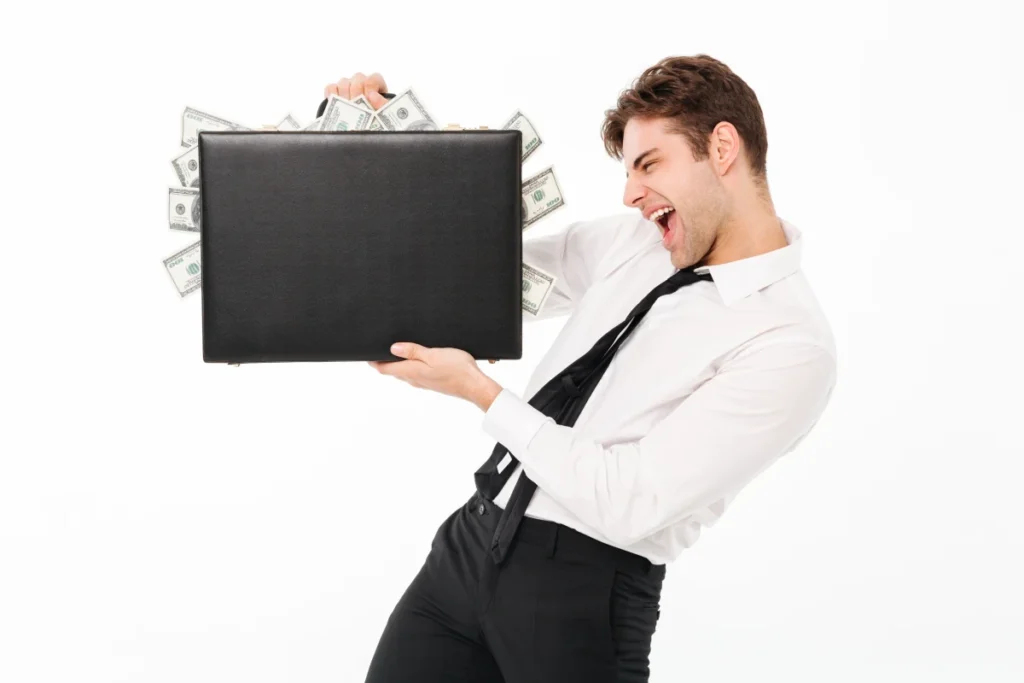 male worker happy with briefcase overflowing with money because he used a Computer Time Clock Software