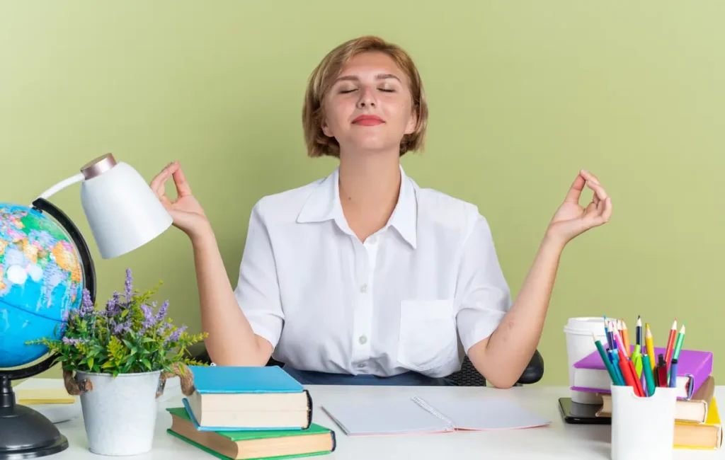 Employee taking a mindful break at their desk to maintain work-life balance