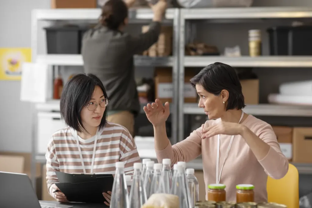 Small business team discussing time tracking software options and long-term ownership decisions