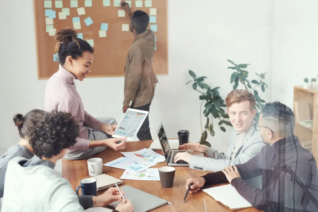 Small business team working together, a group that benefits from simple time tracking software
